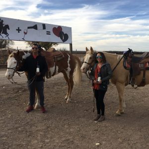 a group of people riding on the back of a horse